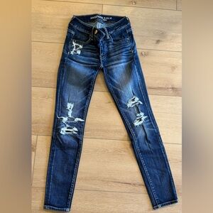 AE distressed skinny jeans